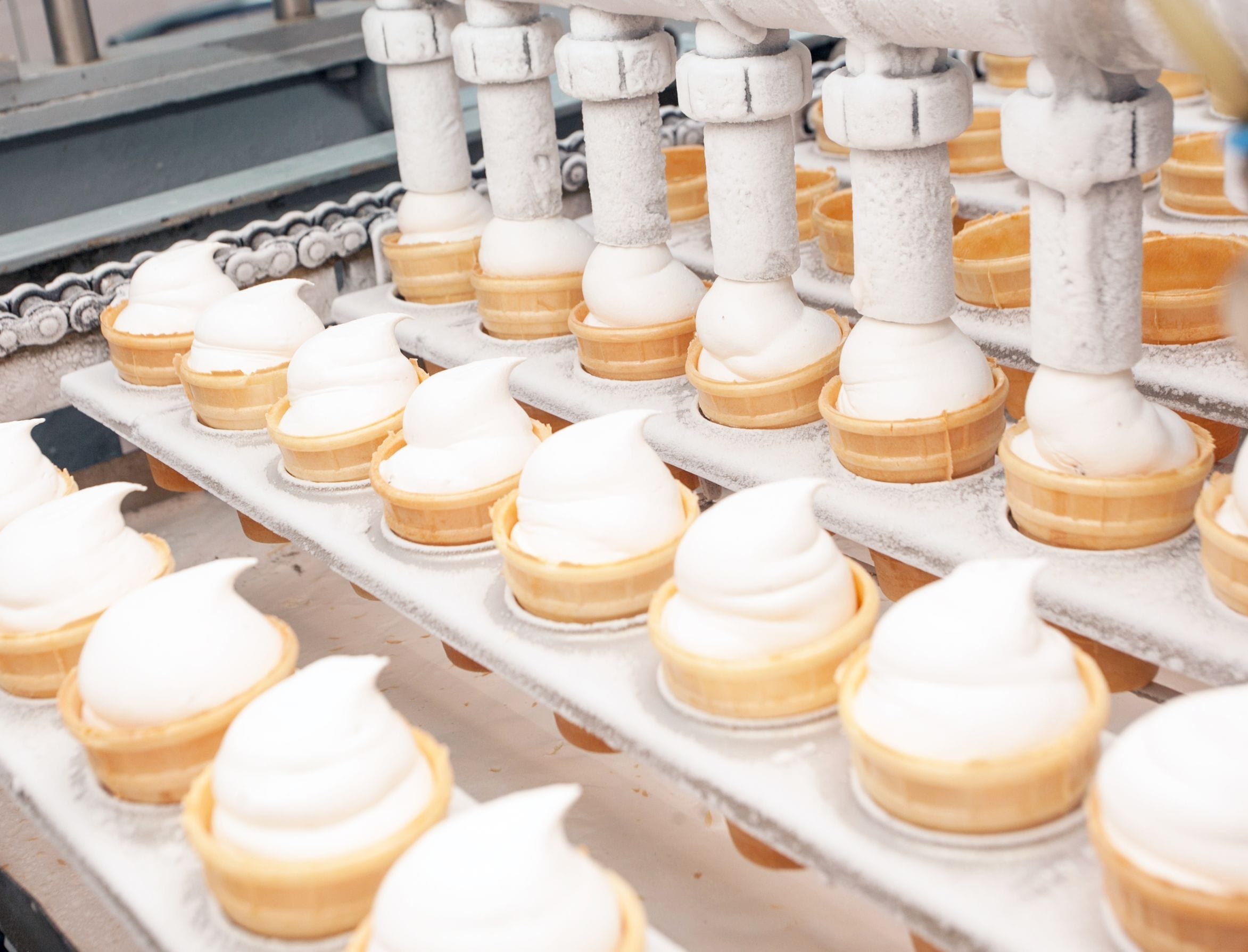 Automated preparation of ice cream in factory