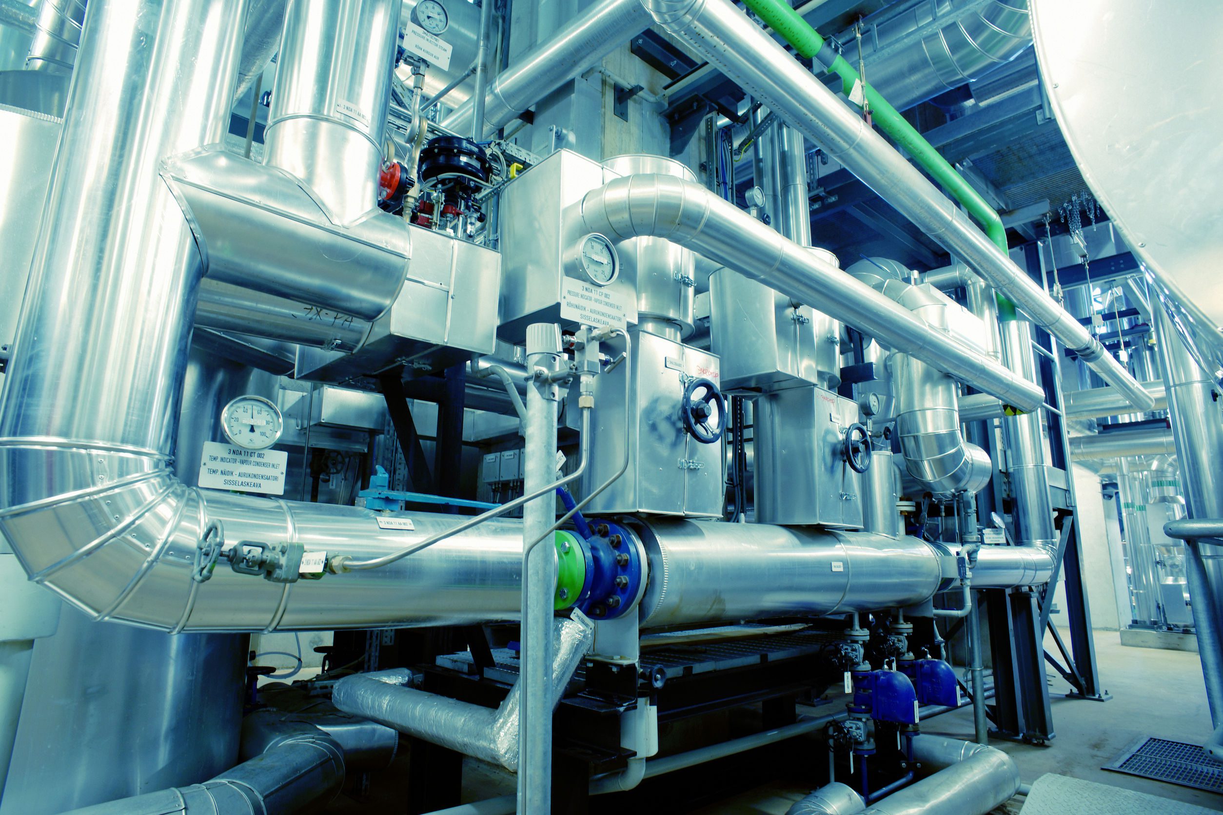  Liquid filling machines filling bottles with corn oil on the production line