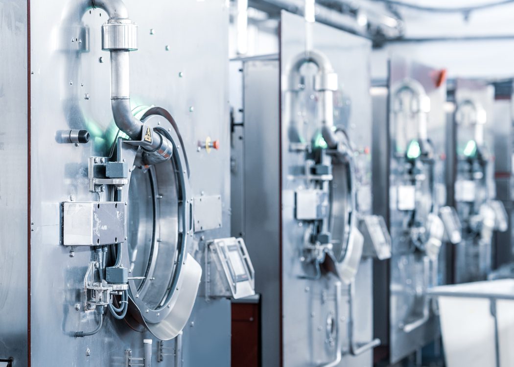  Liquid filling machines filling bottles with corn oil on the production line